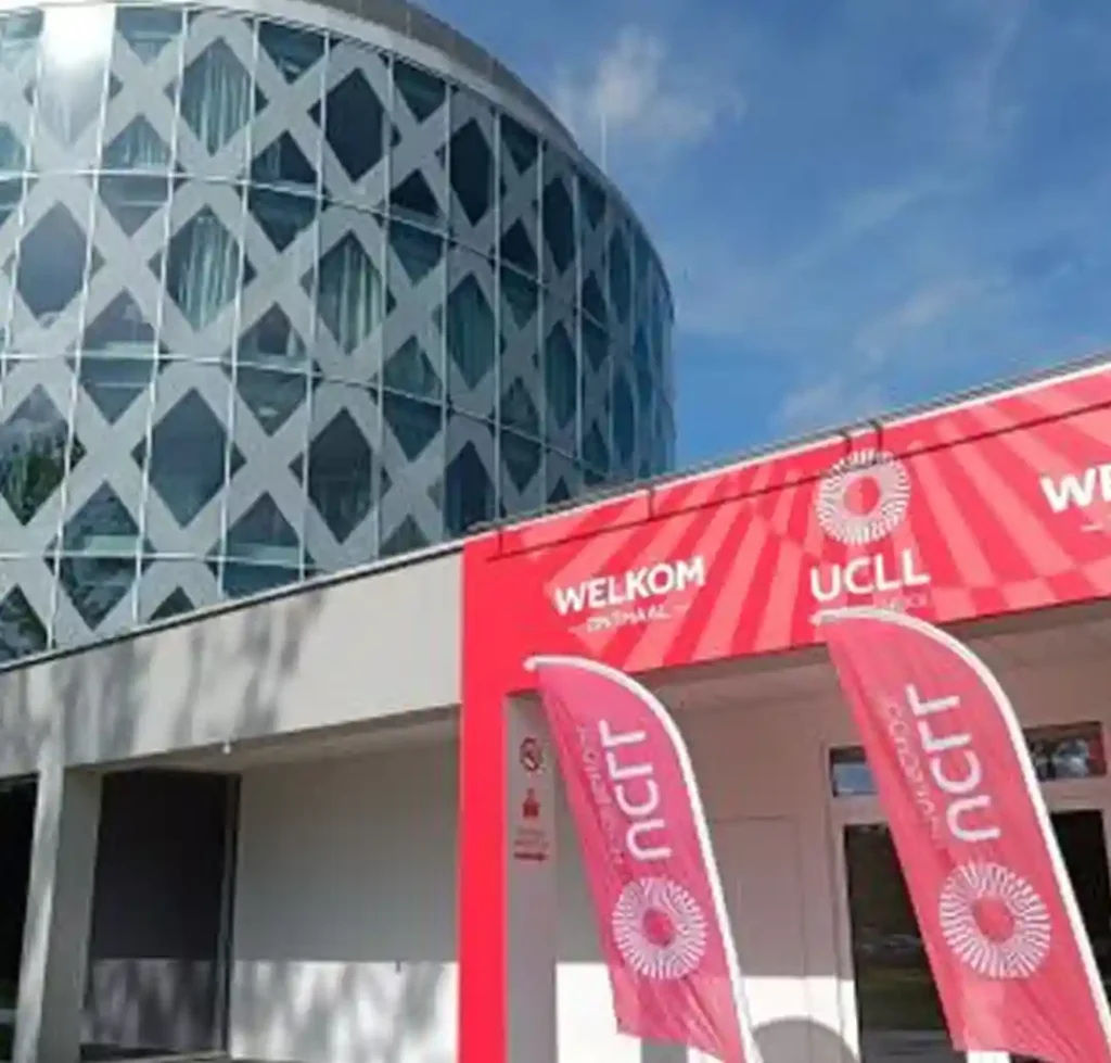 UCLL University of Applied Sciences campus with students engaged in learning activities.